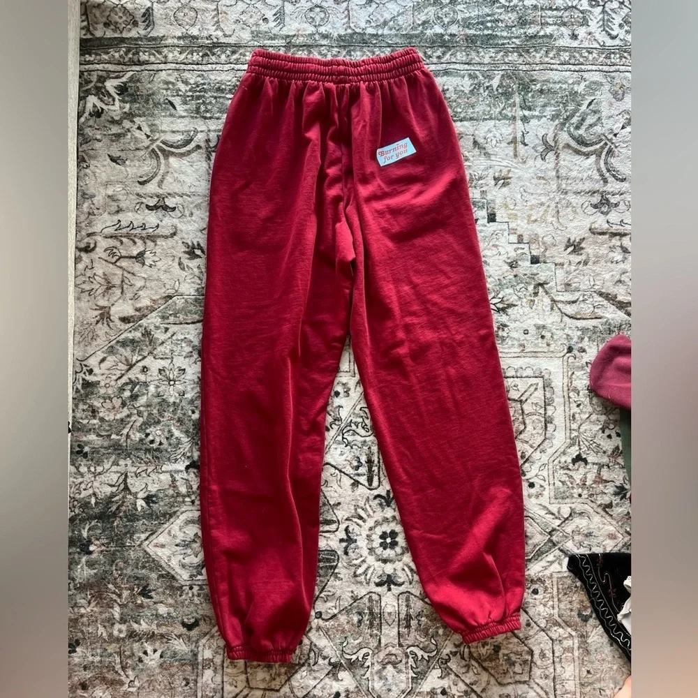 TALENTLESS Red “Burning for You” sweatpants